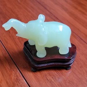 Light green jade elephant trunk up